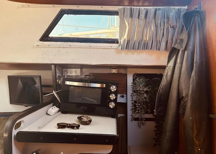 Deolinda Charming Boat At Oriente Marina *