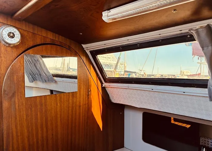 Deolinda Charming Boat At Oriente Marina *